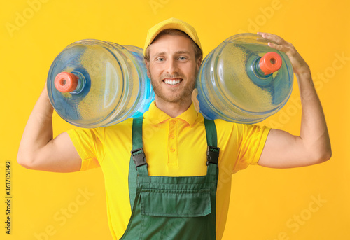 Delivery man with bottles o...
