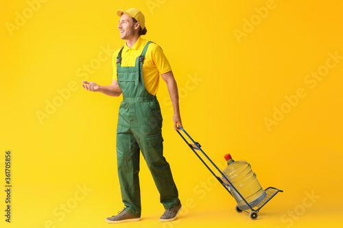Delivery man with bottle of...