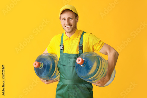 Delivery man with bottles o...