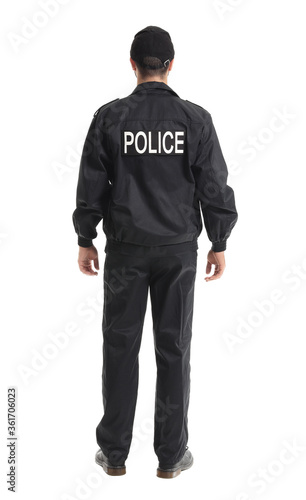Handsome policeman on white background, back view