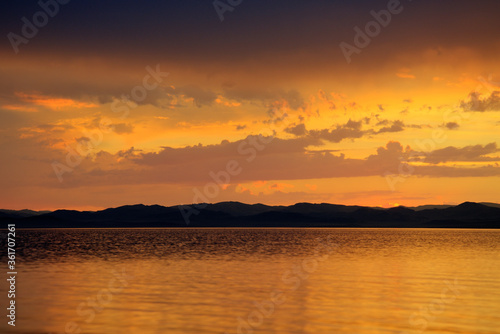 Fototapeta Naklejka Na Ścianę i Meble -  Sunset on the Yenisei River. Southern Siberia