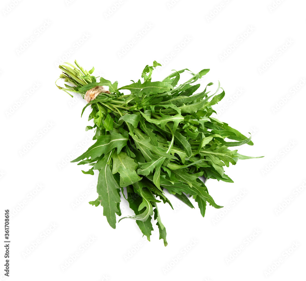 Fresh arugula on white background Fresh arugula on white background