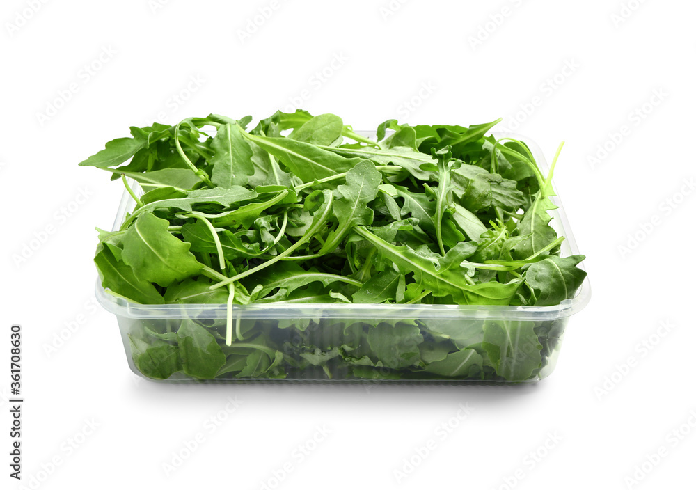 Fresh arugula on white background Fresh arugula on white background