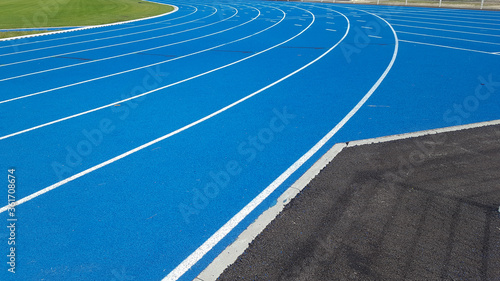 blue race stadium and running track detail for outdoor athletics sport