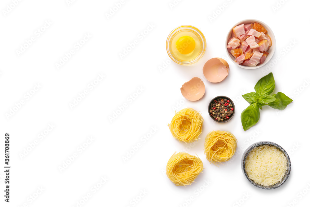 Ingredients for tasty pasta carbonara on white background