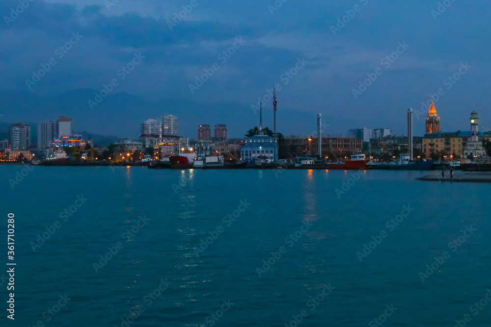 Batumi, Adjara, Georgia. View from the sea on illuminated resort town at evening