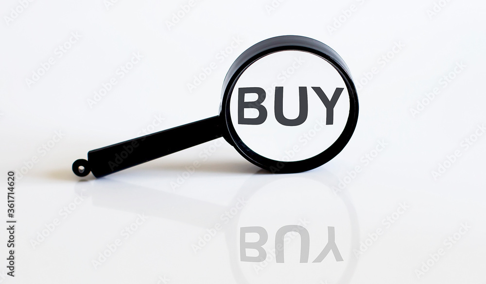 Magnifier with text BUY on the white background Magnifier with text BUY on the white background