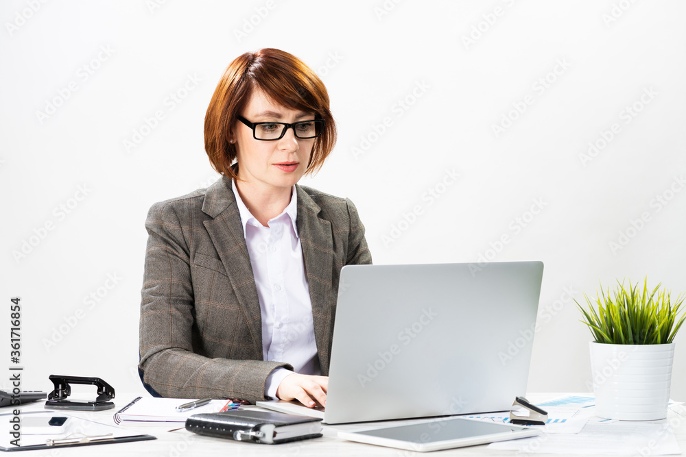 Attractive middle aged businesswoman working Attractive middle aged businesswoman working