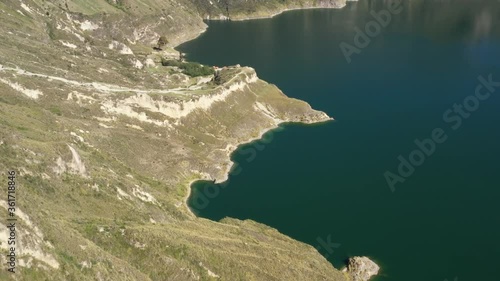 Aerial view of the edge of the Quilotoa lake, a lake from an inactive vulcano in Ecuador
