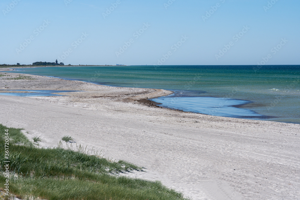 Beautiful white sand beach and turquoise water in Falsterbo, Skanor, Sweden.