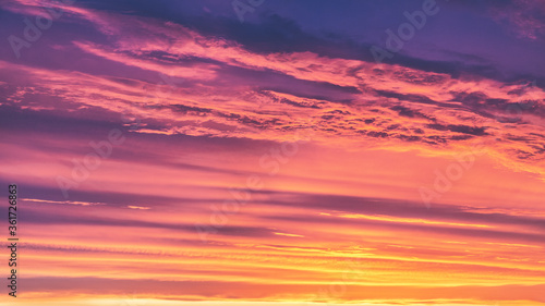 Summer sunset. Evening sky with orange clouds.  © Kot63