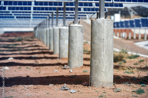 Solid cement columns under solar photovoltaic panels
