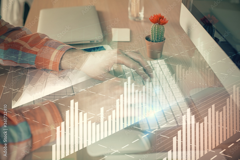 Double exposure of stock market chart with man working on computer on background. Concept of financial analysis. Double exposure of stock market chart with man working on computer on background. Concept of financial analysis.
