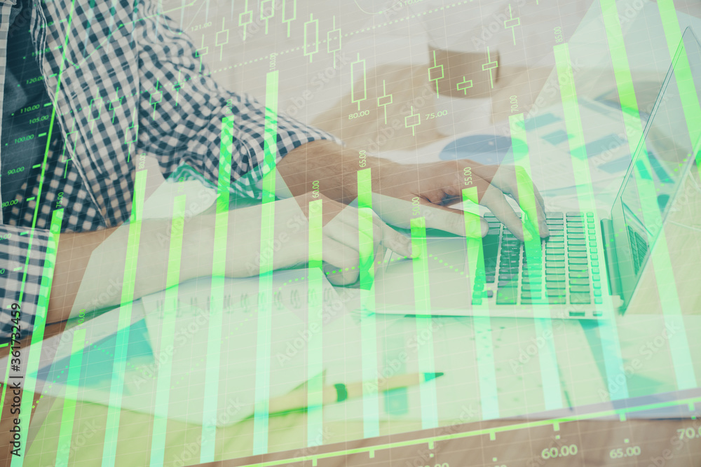 Multi exposure of stock market chart with man working on computer on background. Concept of financial analysis. Multi exposure of stock market chart with man working on computer on background. Concept of financial analysis.