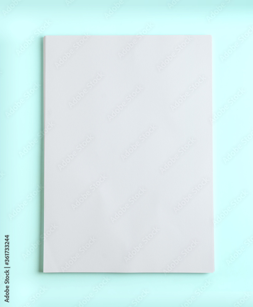 stack of papers on blue background stack of papers on blue background