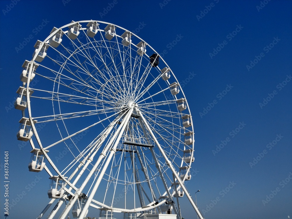 Ferris wheel at black sea, on a sunny day.