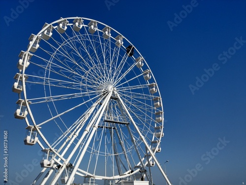 Ferris wheel at black sea  on a sunny day.