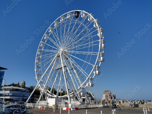 Ferris wheel at black sea, on a sunny day. © xpabli