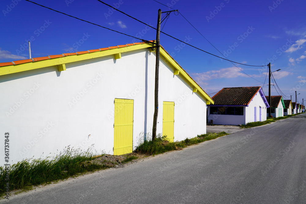 ares oyster village in Arcachon Bay with colorful hut ares oyster village in Arcachon Bay with colorful hut