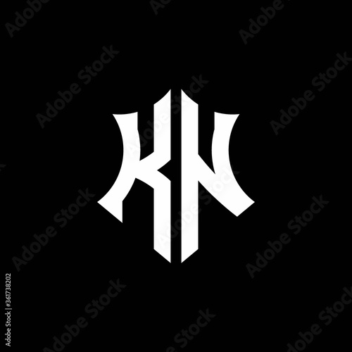 KN monogram logo with a sharp shield style