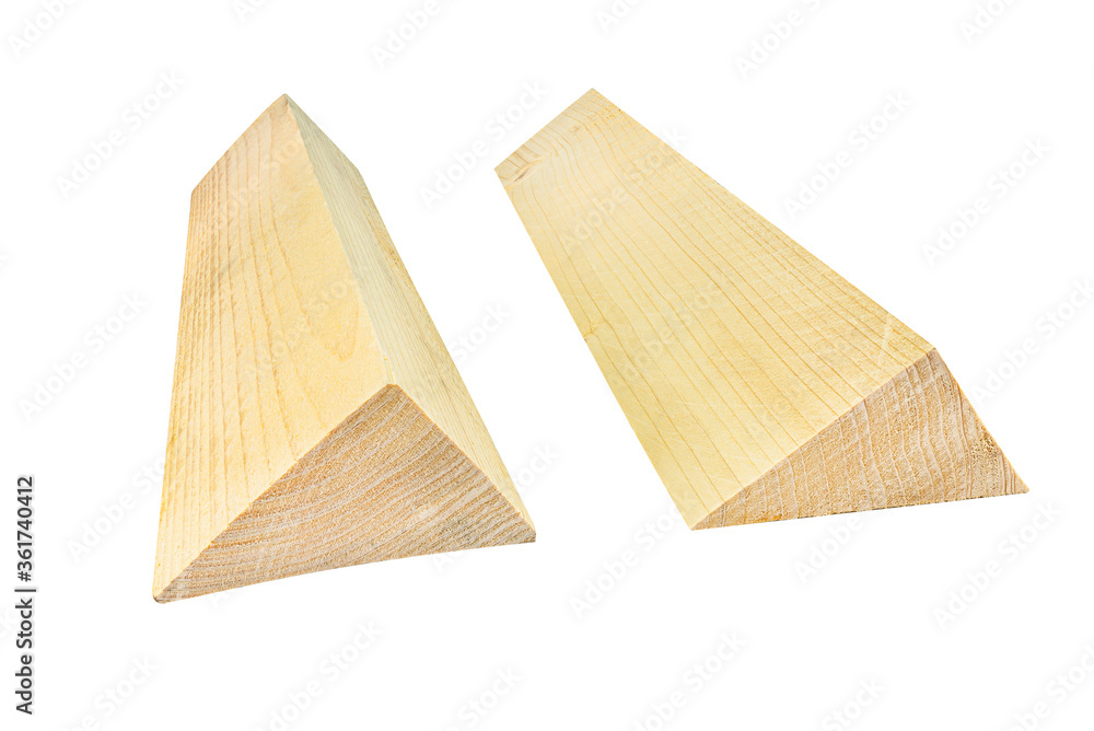 Two wooden wedges isolated on a white background with a clipping path. Two wooden wedges isolated on a white background with a clipping path.