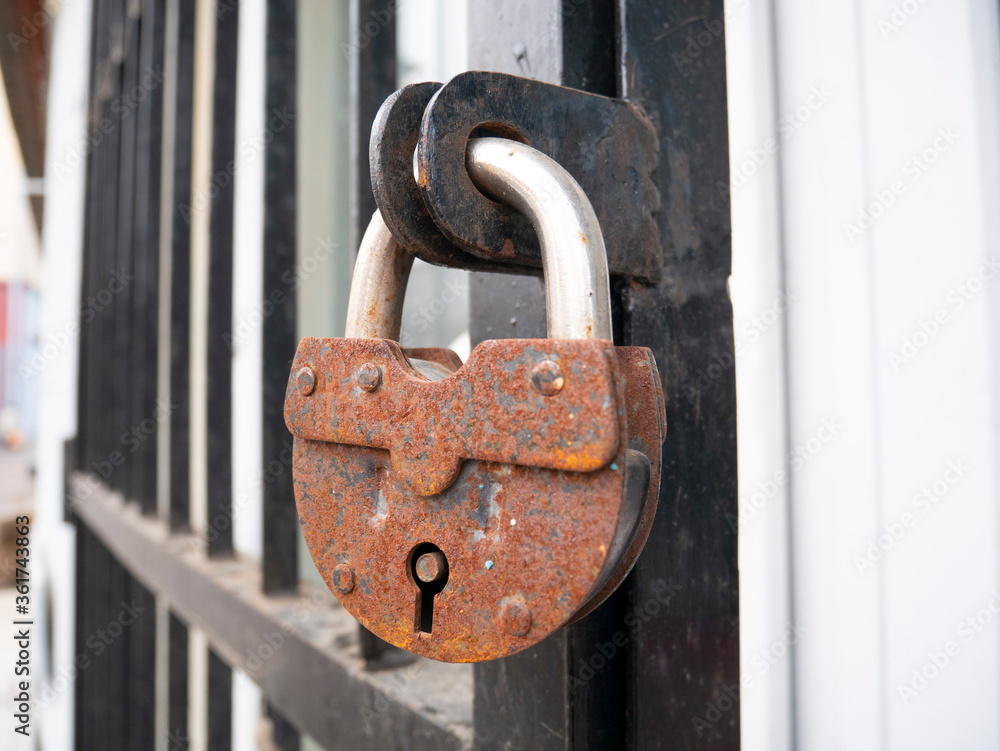 Rusty padlock on the door. Rusty padlock on the door.