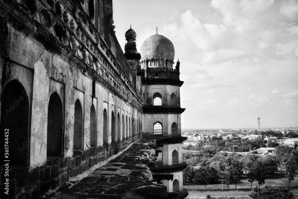 The side part of gol gumbaz monument.The black and white view of the tomb - obrazy, fototapety, plakaty 