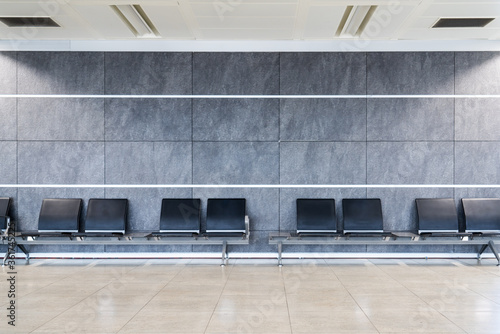A group of seats in a clean nice decorated waiting hall at terminal, airport, mall or a hospital.
