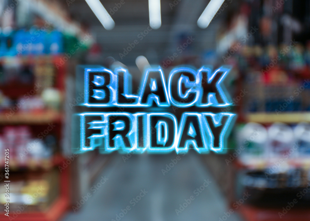 Blurred view of shopping mall interior. Black Friday Sale
