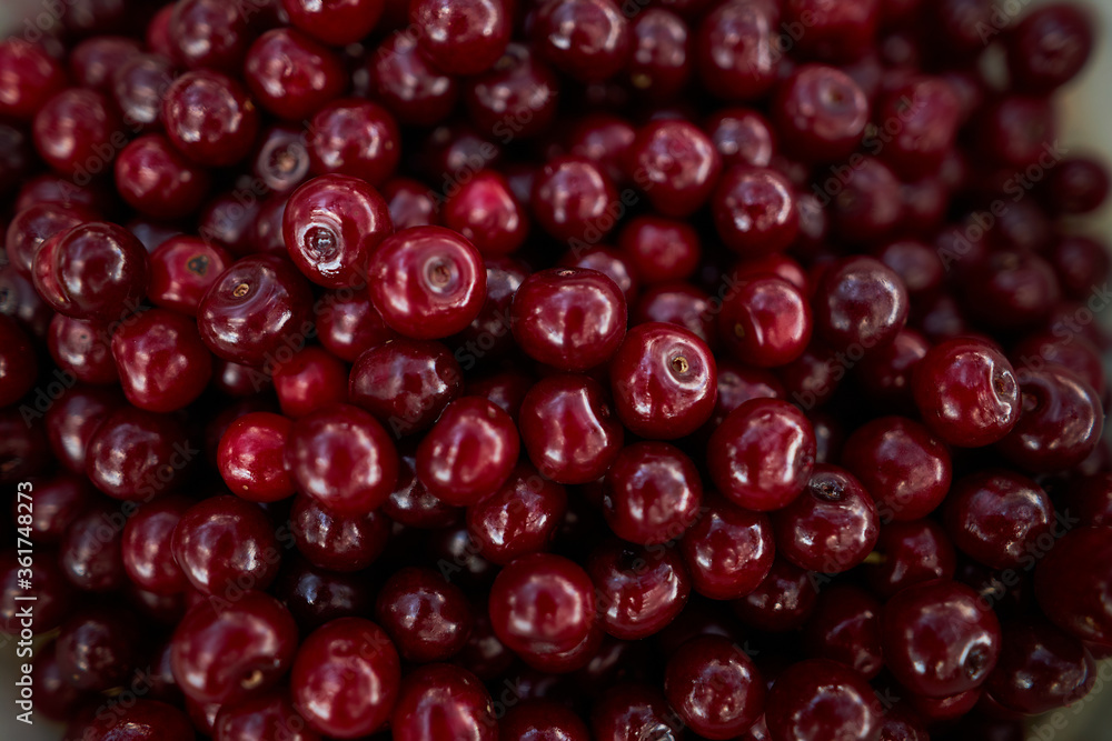 Background from ripe cherries. Harvested ripe cherries. Agriculture. Berries. Cherry. Background from ripe cherries. Harvested ripe cherries. Agriculture. Berries. Cherry.