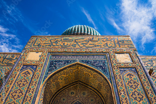Mausoleum of Khoja Ahmed Yassawi 1385. Museum of History and Culture. Fragment of the facade. UNESCO World Heritage Site. The author of the project is Khan Tamerlan. Sufism. Islam. Brick Decor - Glaze