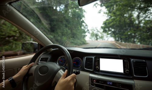 People driving car on country road