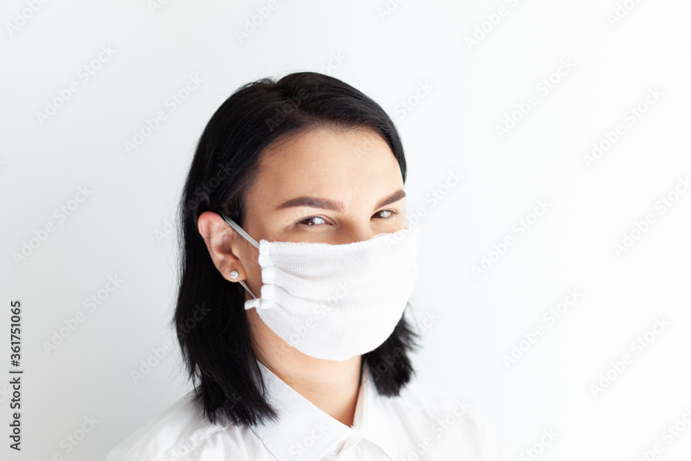 woman in medical mask on a white background woman in medical mask on a white background