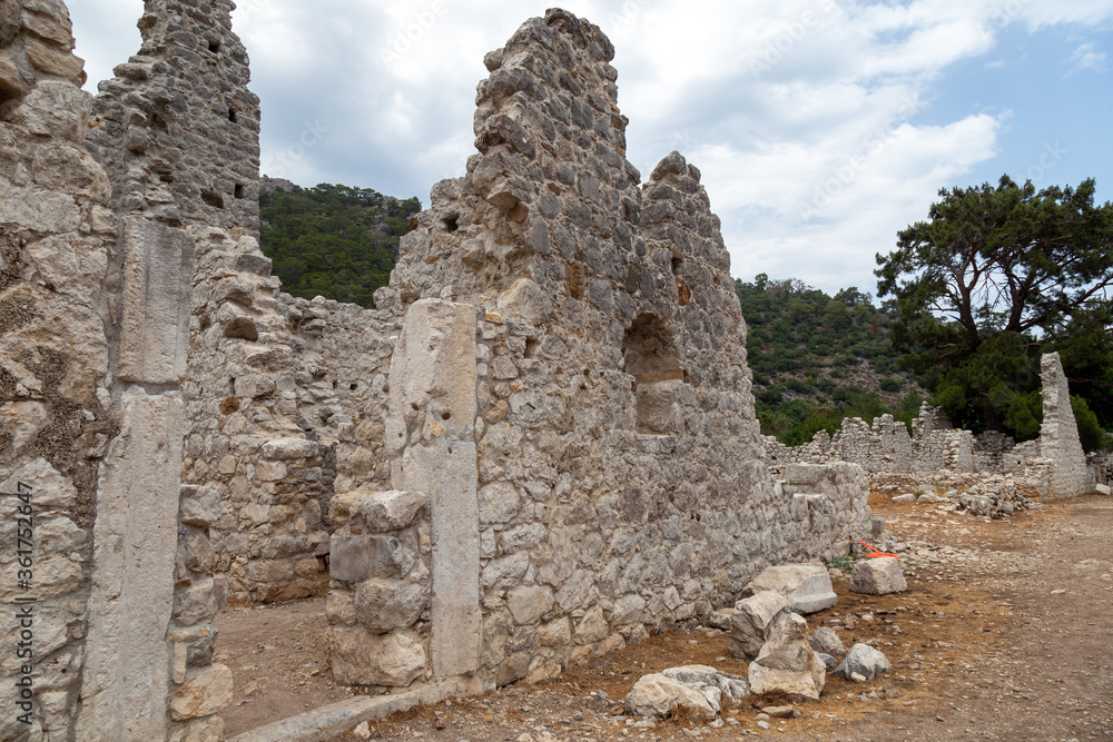 Naklejka premium Ruins of the ancient city of Olympos in Cirali village in Antalya, Turkey