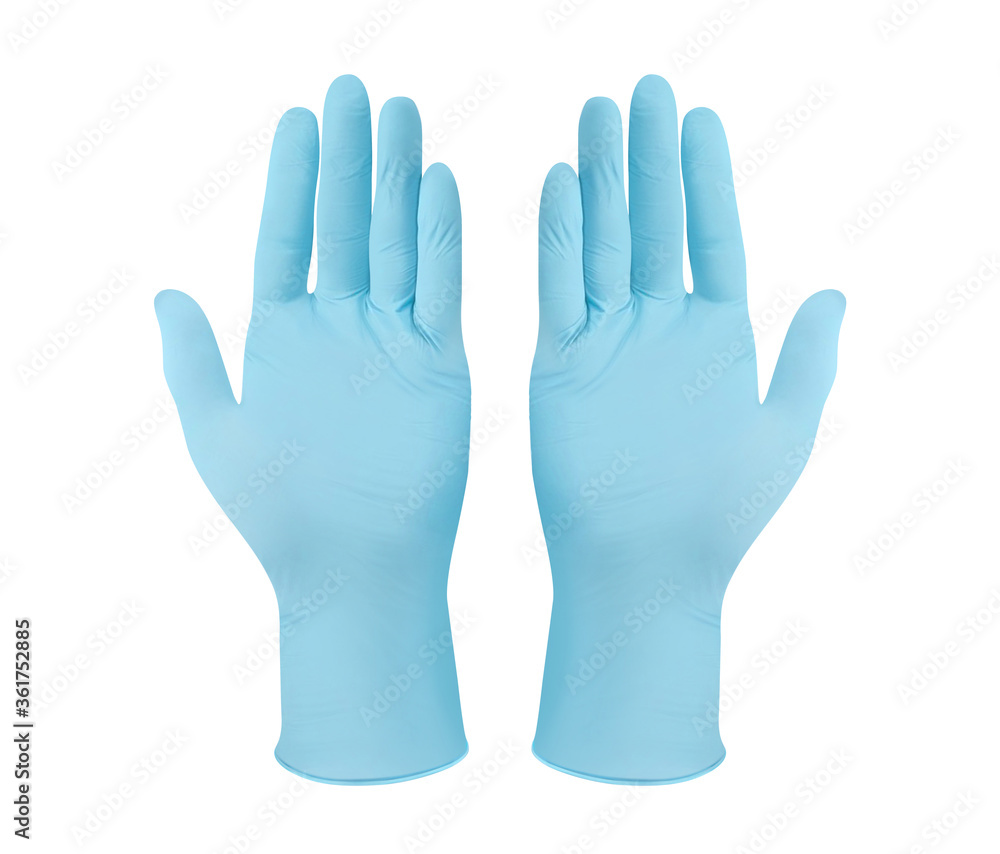 Medical nitrile gloves.Two blue surgical gloves isolated on white background with hands. Rubber glove manufacturing, human hand is wearing a latex glove. Doctor or nurse putting on protective gloves Medical nitrile gloves.Two blue surgical gloves isolated on white background with hands. Rubber glove manufacturing, human hand is wearing a latex glove. Doctor or nurse putting on protective gloves