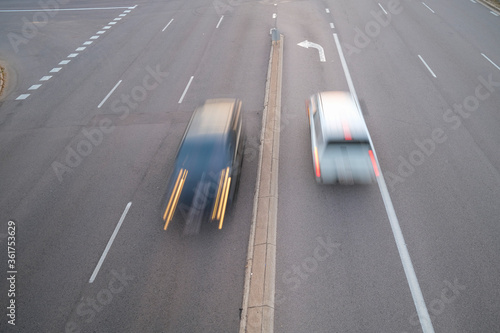 High angle view of cars zooming on a road