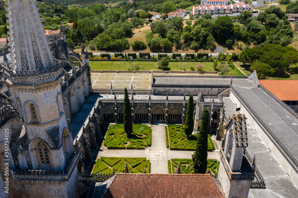Batalha, Portugal - June, 29, 2020: Aerial Drone View of Batalha Monastery. Dominican convent with manueline style architecture.