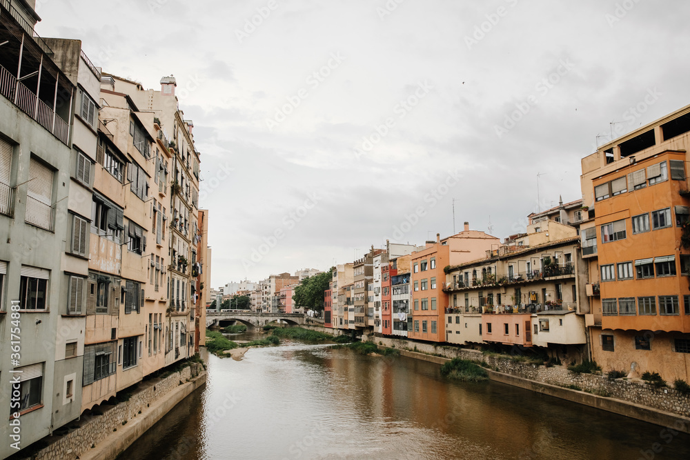 Old architecture and colorful houses by the river in Gerona, Spain