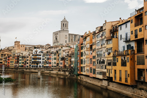 Old architecture and colorful houses by the river in Gerona, Spain © kotelnyk