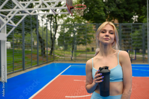 Young girl with a bottle of water