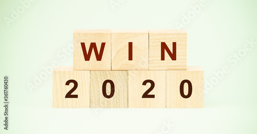 win 2020 inscription on wooden blocks business concept