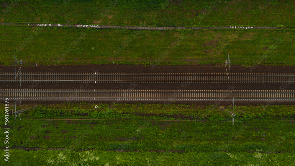 Fototapeta premium Large railway station with freight trains. Beautiful geometry of railway tracks