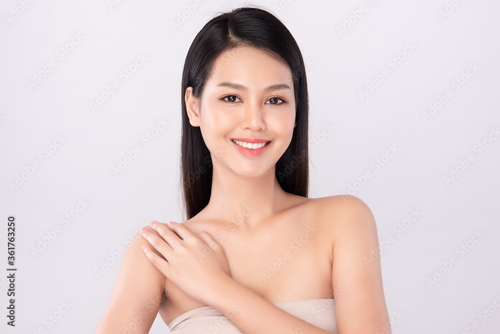 Beautiful Young Asian Woman touching her body with fresh Healthy Skin, isolated on white background, Beauty Cosmetics and Facial treatment Concept. Beautiful Young Asian Woman touching her body with fresh Healthy Skin, isolated on white background, Beauty Cosmetics and Facial treatment Concept.