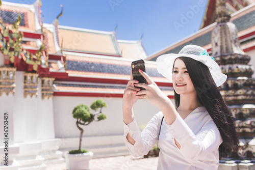 Journey girl in Temple of Thailand