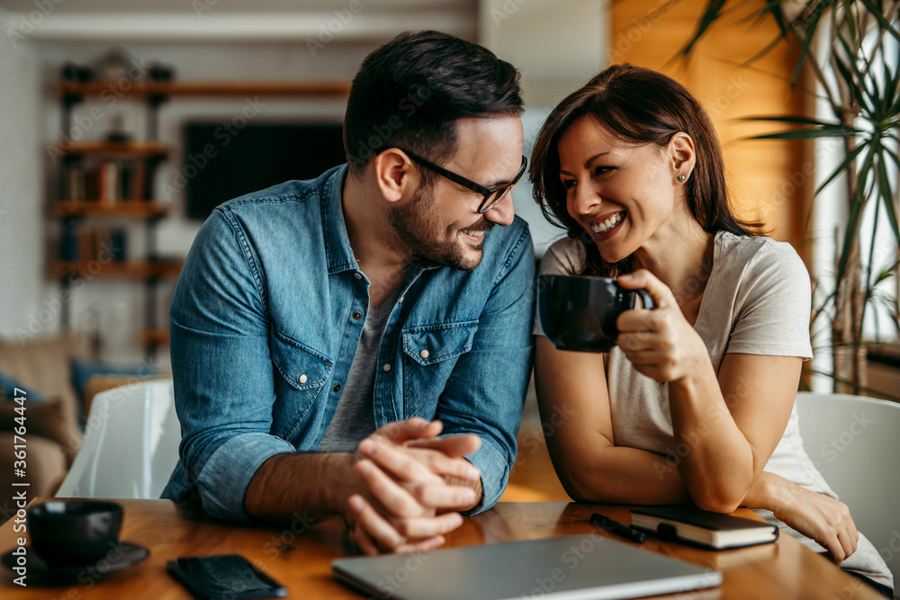 © bnenin - Cute loving couple relaxing at home, portrait.