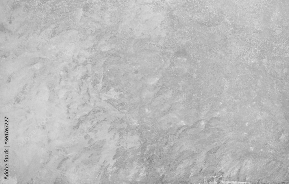 Light gray cement background,gray texture,cement wallpaper,abstract cement to use as wallpaper.