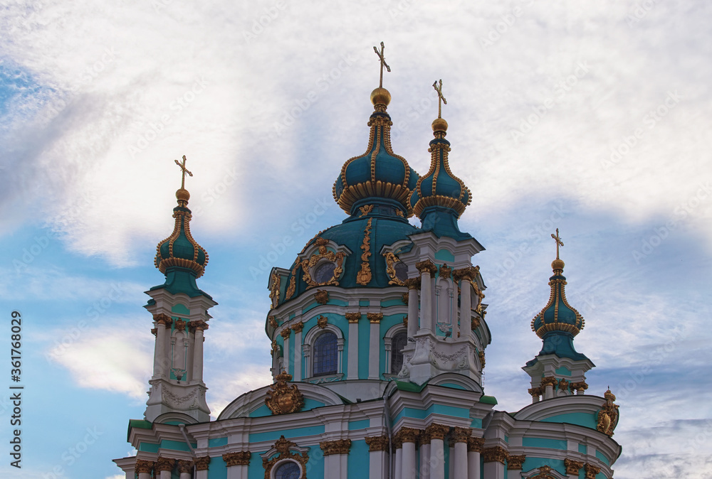 Detailed view of Baroque style Saint Andrew?s Church against colorful vibrant sky with fantastic soft clouds. It is one of the main attractions of the city. Famous romantic travel destination