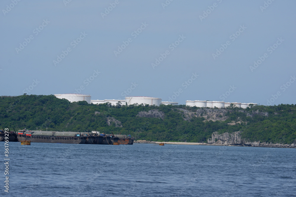 Crude oil storage tank on the island in the sea
