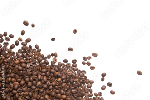 Roasted coffee beans isolated on white background. Close up of a brown surface texture of aroma black caffeine drink ingredient for coffee beverage.
