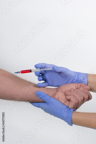 Wallpaper Mural Nurse administering injectable treatment to a patient on a white background Torontodigital.ca